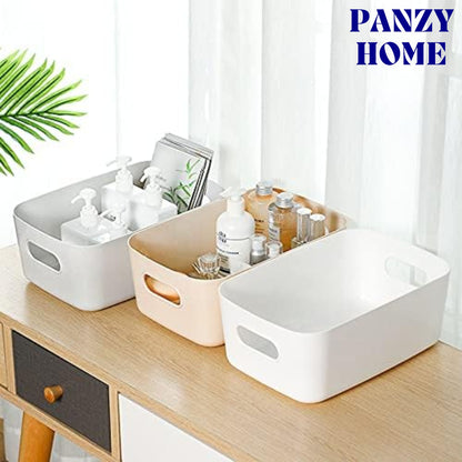 Storage baskets containing skincare or cleaning products 
