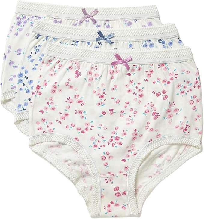 Set of three floral-patterned underwear with ribbons on a white background