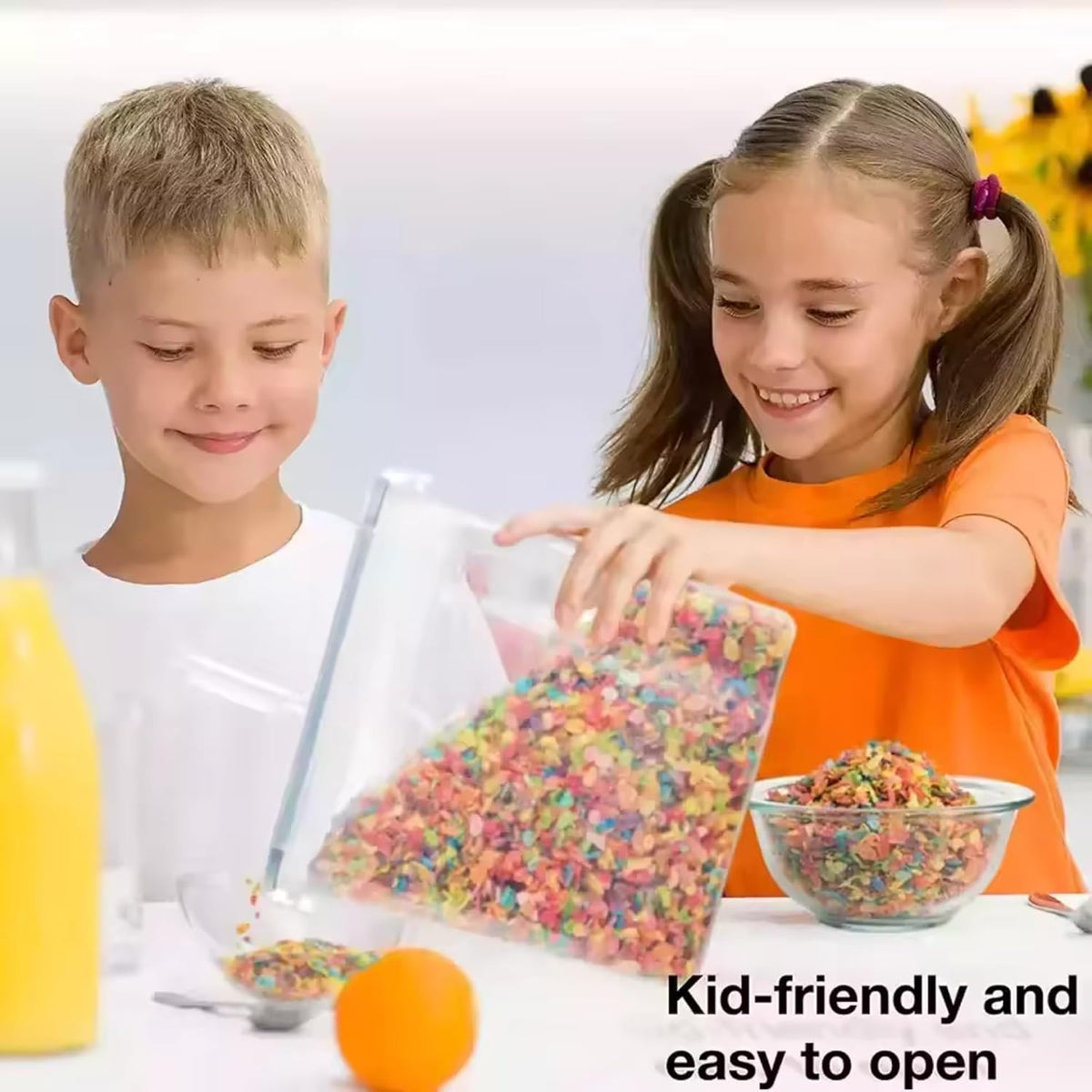 Two children with a bag of colorful cereal and a cereal storage container and a bowl on a white background.