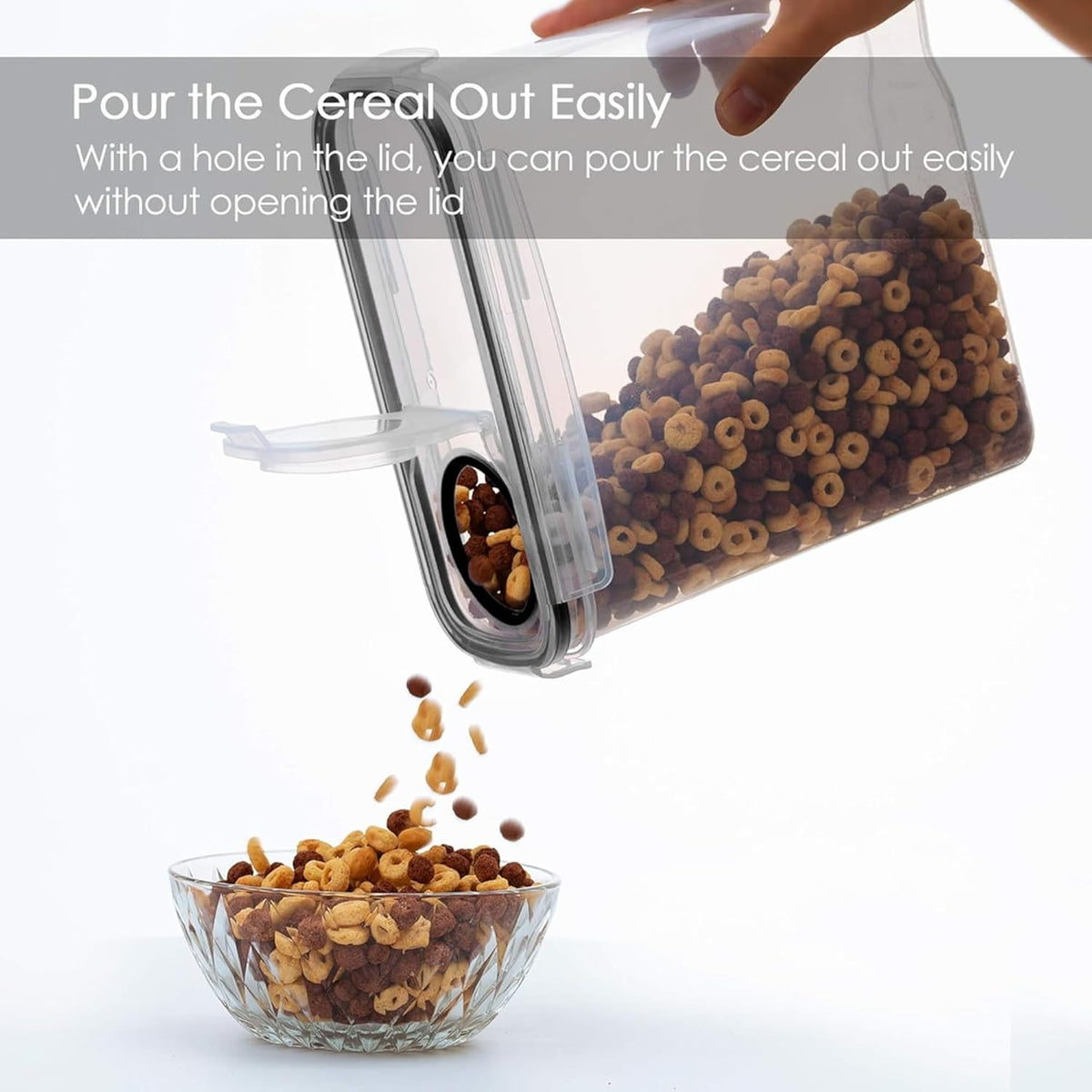 Cereal container with a hole in the lid being used to pour cereal into a bowl.