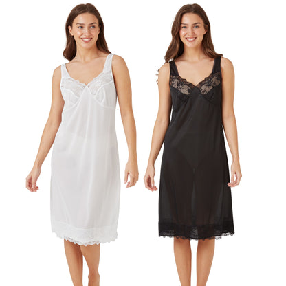 Two women wearing white and black nightgowns full slips on a white background