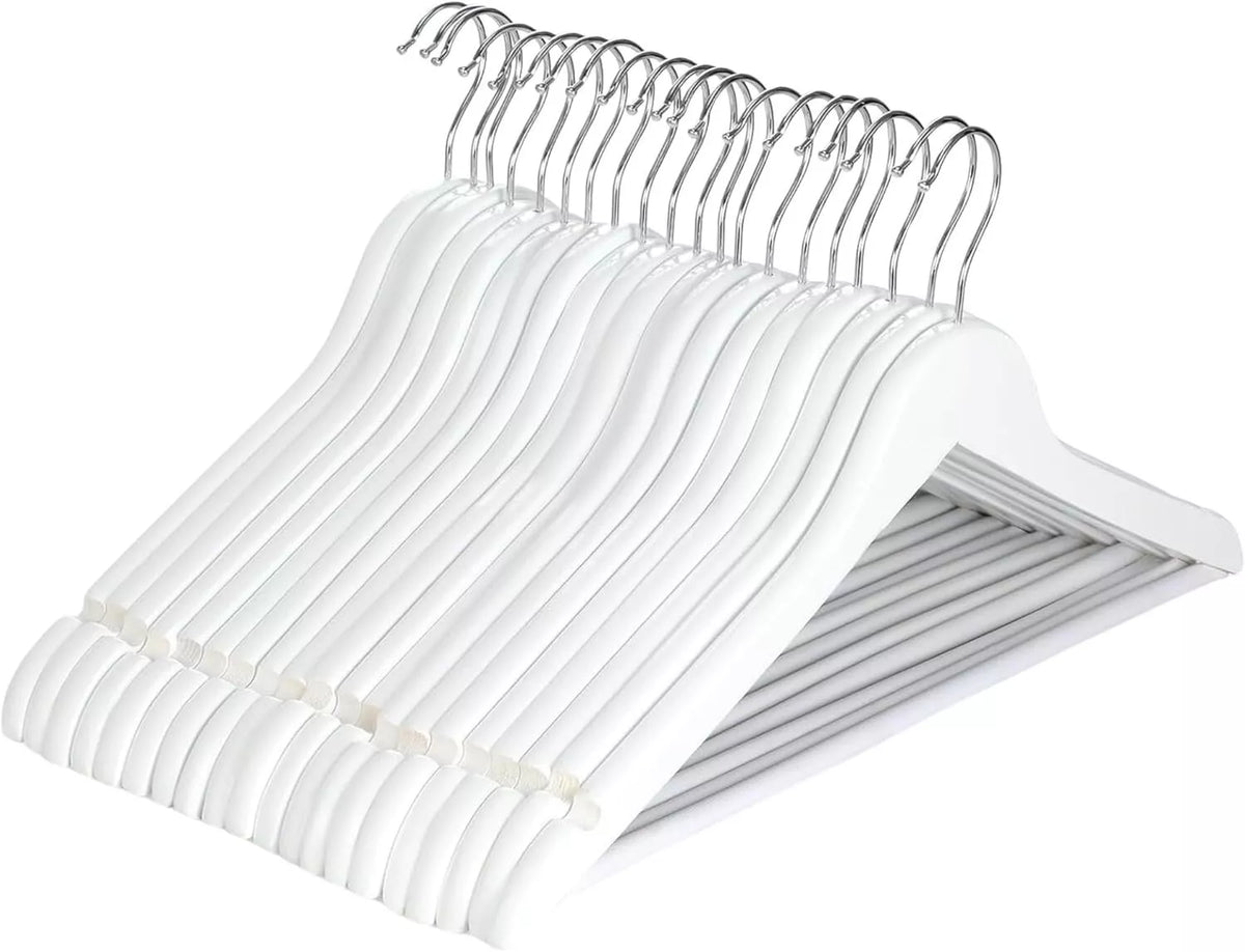 Set of white hangers with chrome hooks on a white background